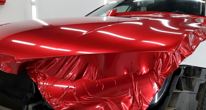 Self -adhesive vinyl film on a car